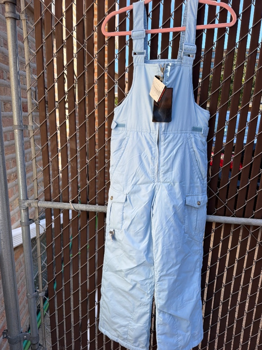 Cold weather ZeroXposur snow bibs adjustable straps and are sized for a child Me